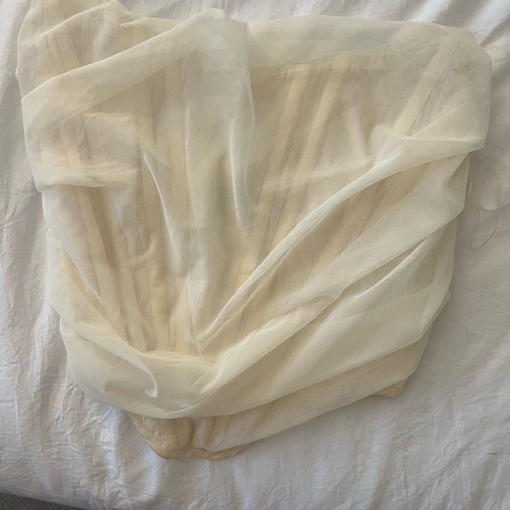 Elegant Sheer Cream Fabric